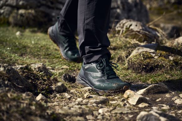 Close-up of hiking shoes in the countryside